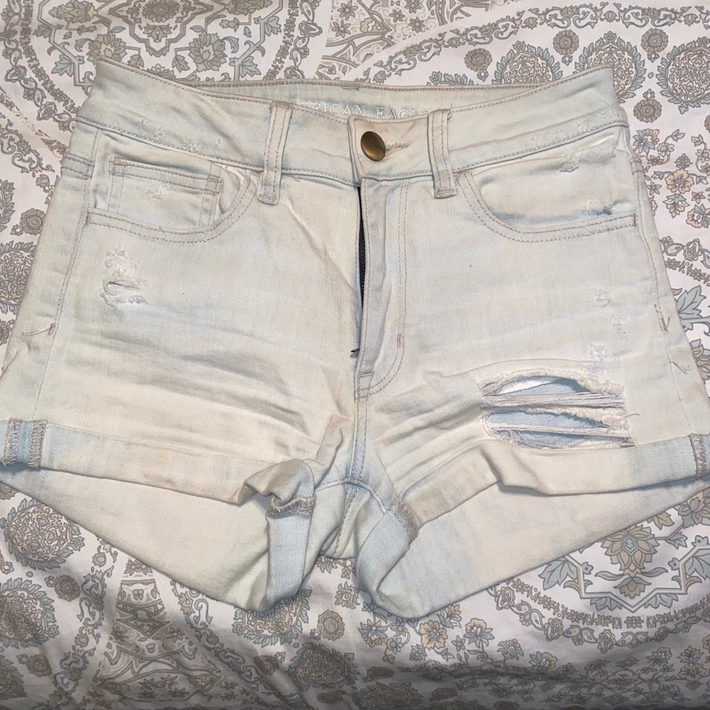 Blue distressed denim shorts